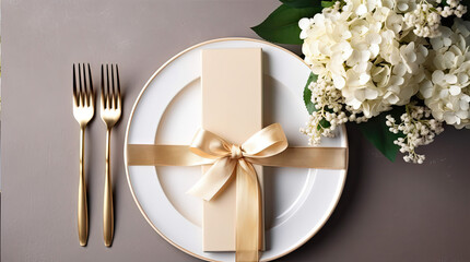 Festive wedding, birthday table setting with golden cutlery, silk ribbon, eucalyptus branches, hydrangea and white roses flowers. Blank card mockup. Restaurant menu concept. Flat lay, top view