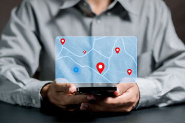 Businessman searching for location on map and pin on virtual screen. GPS app, Destination travel...