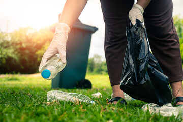 Group of people help garbage plastic collection for to keep clean.