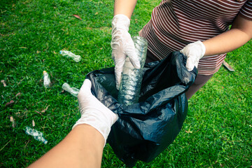 Group of people help garbage plastic collection for to keep clean.