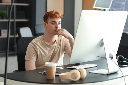Male programmer working in office