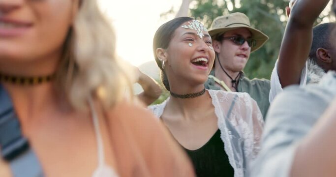 Dance, festival and music with woman in crowd for celebration, concert and energy in nature. Freedom, community and party with people dancing in audience for gen z, social event and friends