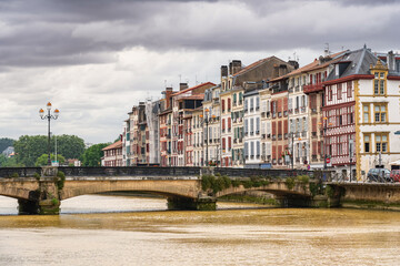 Medieval bridge that crosses the Adur River as it passes through the ancient city of Bayonne, France.