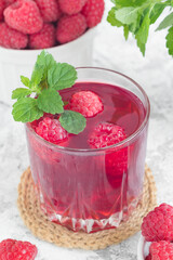 Fresh summer drink with orgnic raspberry and mint.