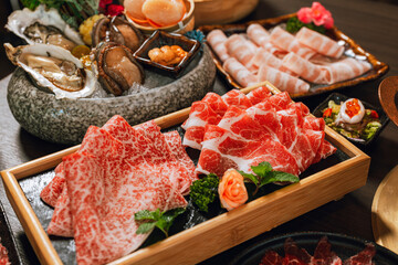 Seafood cuisine plate and beef sliced meat for hot pots. pork slices, scallops,  seashells,...