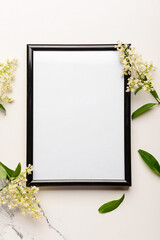 Blank photo frame and beautiful lilac flowers on white background