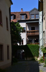 Fototapeta na wymiar Narrow Street in the Old Town of Regensburg, Bavaria