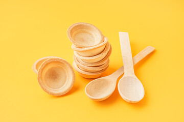 Homemade tartlets on yellow background