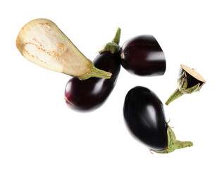 Flying fresh eggplants on white background