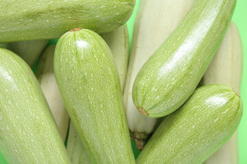 Fresh green zucchini as background