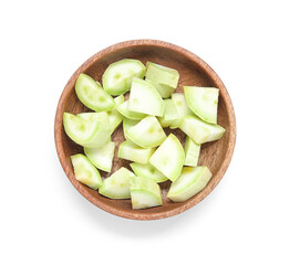 Bowl with pieces of fresh green zucchini on white background