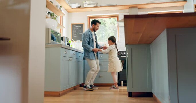 Ballet, girl and father dance together in a kitchen with love and support for excited dancer and ballerina daughter. Tutu, dad and man dancing with child and bonding with kid in house or home