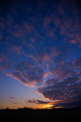 Fototapeta na wymiar Radiant Dawn: Majestic Colorful Sunrise Painting the Summer Fields in Northern Europe
