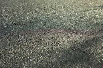 New asphalt. Texture of road surface. Hot asphalt.
