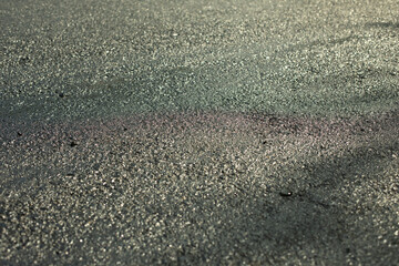 New asphalt. Texture of road surface. Hot asphalt.