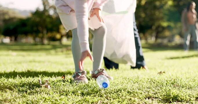 Cleaning, recycling and child in park with litter for community service, volunteering and sustainability. Eco friendly, charity work and girl with bag for picking trash, plastic and garbage in nature