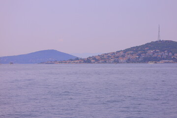 Panorama silhouette Istanbul city buildings from water Bosphorus, a public place	
