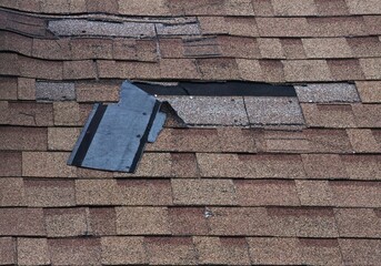 Shingle Torn and Flipped Over © Bill McKeon