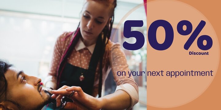 50 percent discount text with diverse male client and female barber trimming beard