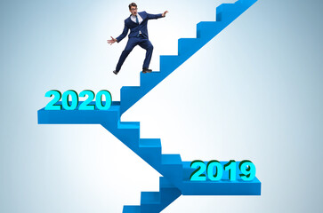 Businessman climbing stairs on yearly basis