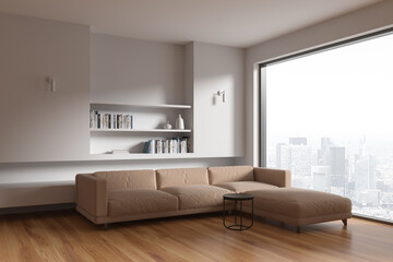 Stylish living room interior with couch and shelf with decor, panoramic window