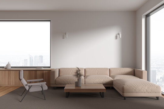 White living room interior with sofa and armchair