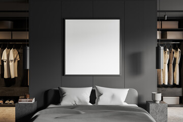 Grey hotel bedroom interior with bed and clothes in wardrobe. Mockup frame