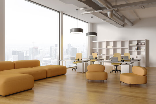 White panoramic open space office with lounge area