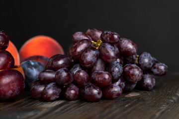Ripe fresh grapes on a board