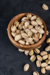 a large number of salty and crispy pistachios close-up
