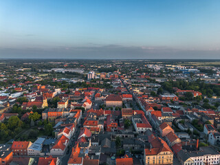 Obraz premium Aerial summer skyline panoramic view of the old town in Pleszew, Wielkopolska, Poland, at sunset