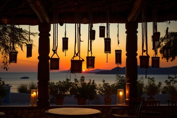 Silhouette of wind chimes hanging in a Greek taverna