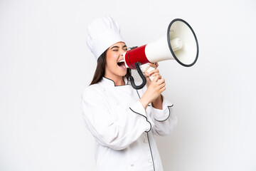 Young Brazilian chef woman isolated on white background shouting through a megaphone