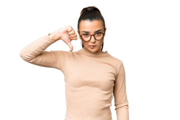 Young beauty woman over isolated chroma key background showing thumb down with negative expression