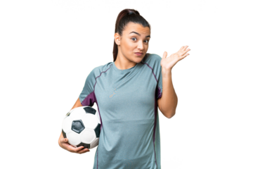 Young football player Woman over isolated chroma key background having doubts while raising hands