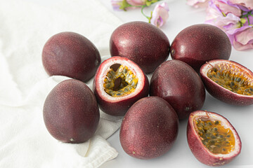 Fresh passion fruit slice and seeds isolated on white background.