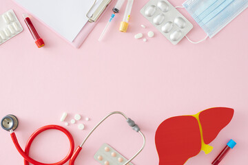 Human liver therapy on World Hepatitis Day. Top view photo of liver symbol, clipboard, medical mask, blood samples, syringe, stethoscope, tablets on pastel pink background with blank space for text