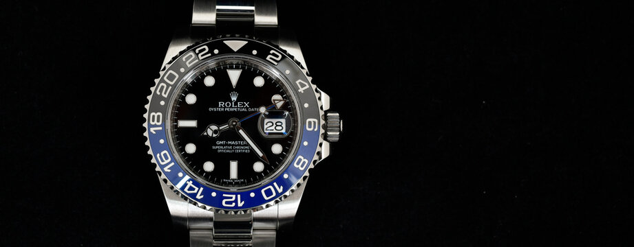 Bangkok Thailand- Feb 20,2022 : Rolex GMT-Master II "Batman"40mm with blue-black bezel Steel Ceramic Men's Wrist watch on black background
