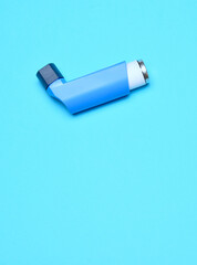 Inhaler for respiratory problems and diseases, vertical shot.