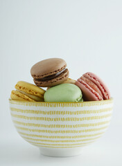 Macarons of various flavors, typical French sweet, copy space.