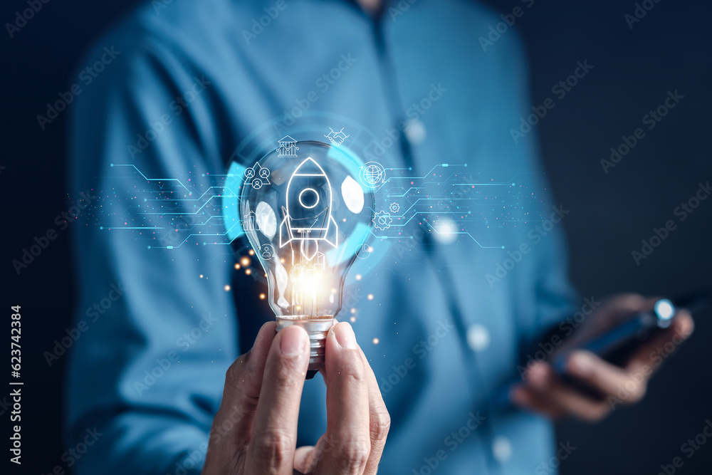Aufkleber Hand Business with rocket launch icon, Fast start up business to goal and success objective target and solution concept...