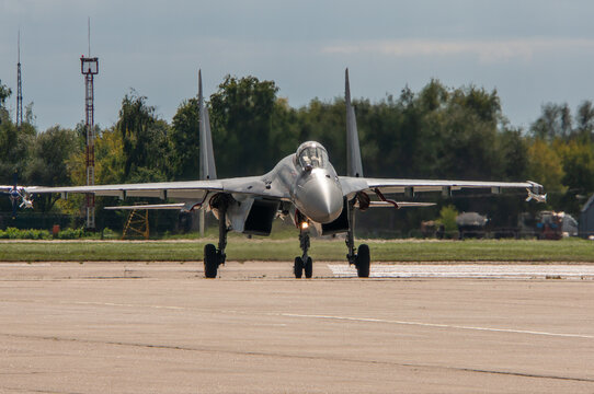 MAKS-2013. Soviet-Russian multi-role fighter Su-35 (NATO - Flanker-E) of "four plus" generation, plus taxis along take-off runway. Aircraft close-up. Zhukovsky, Russia - August 27, 2013
