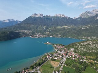Obraz premium Lake Annecy France high angle aerial drone blue skys sunny day.