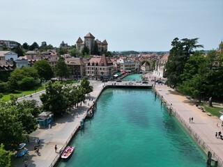 Fototapeta na wymiar Crystal clear water Annecy France harbour and waterfront drone,aerial .