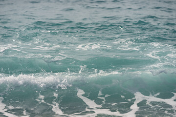 Closeup of coastline wave on mediterranean coast