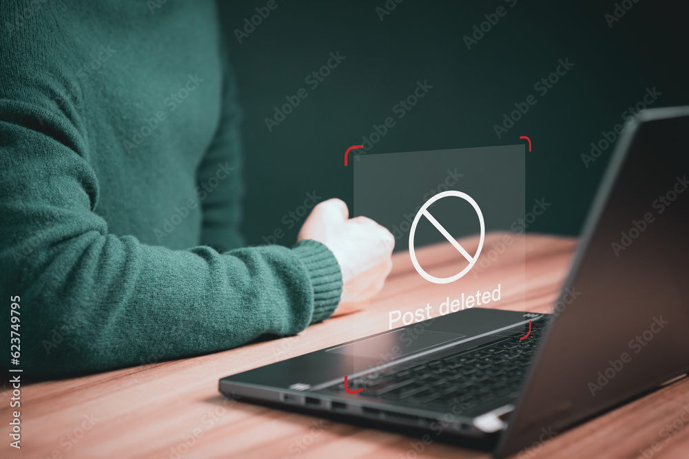 Poster Young man using a computer laptop to play social media on a website, but the post has been deleted. Searching for more internet, search engine optimization.