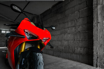 Red motorbike in a garage