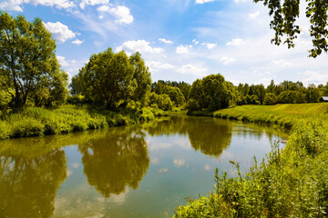 Fototapeta na wymiar A small river Vorya on a sunny summer day. Moscow region, Russia