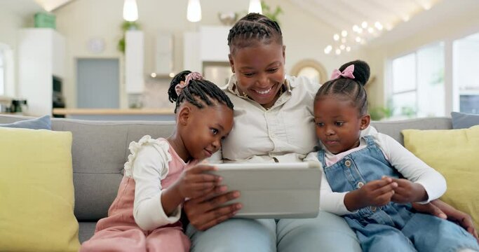 Happy, mother with her girl child and tablet on sofa in living room of their home together. Technology or connectivity, learning or kissing and black family on couch streaming a movie in their house