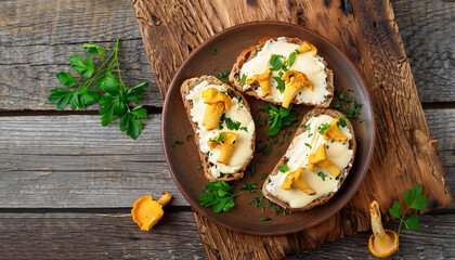 Chanterelle sandwiches with cheese. Open faced sandwich with creamy cheese, seasonings and pepper and fresh parsley on an old wooden background. Mock up. Top view.